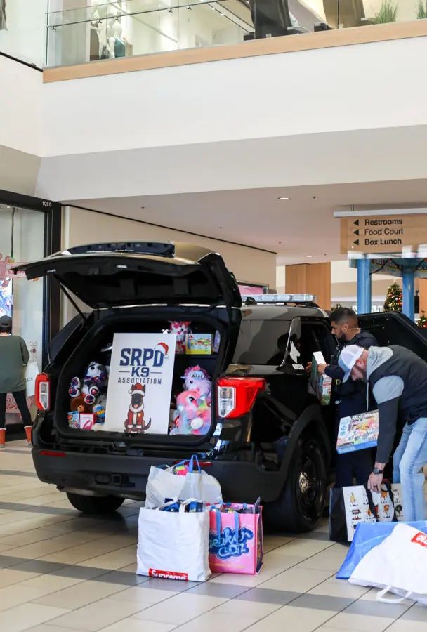 Volunteers loading donated toys